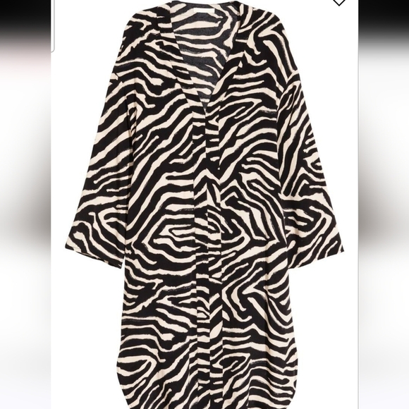 H&M Tops - H&M V neck tunic dress zebra print. Size 12